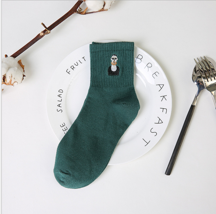 Pop Icon sock in green with a gentlement logo